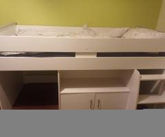 Top bunk bed with stairs