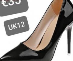 Black high heel shoes size 12